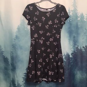 Black sleek roller skate print dress